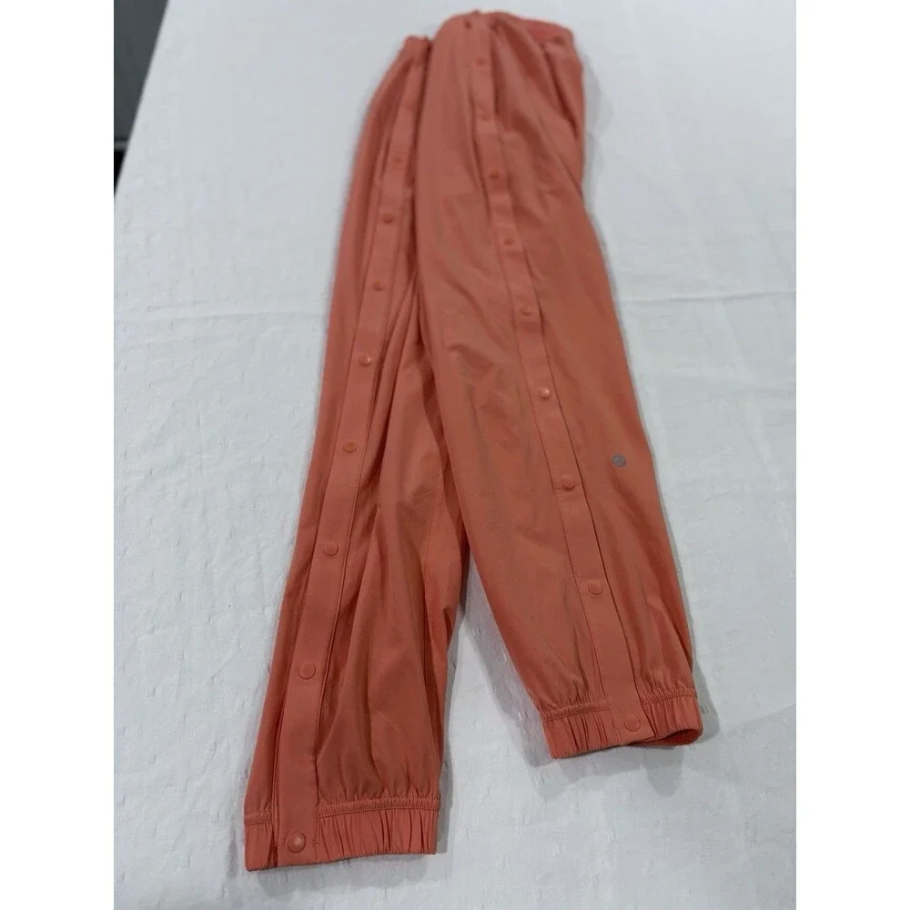 Lululemon Tear-Away Mid-Rise Track Pant Size 6 Coral Kiss Orange Swift LW5GAXS